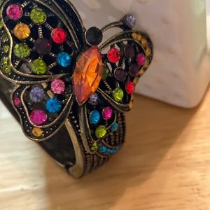 Butterfly bracelet-like new-Clip on very unusual.  Colorful